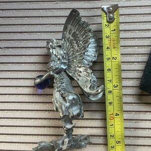 Metal fairy with marble